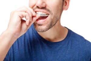 How Can You Relieve Invisalign Pain in the First Few Days? McNamara Orthodontics in Ann Arbor, MI